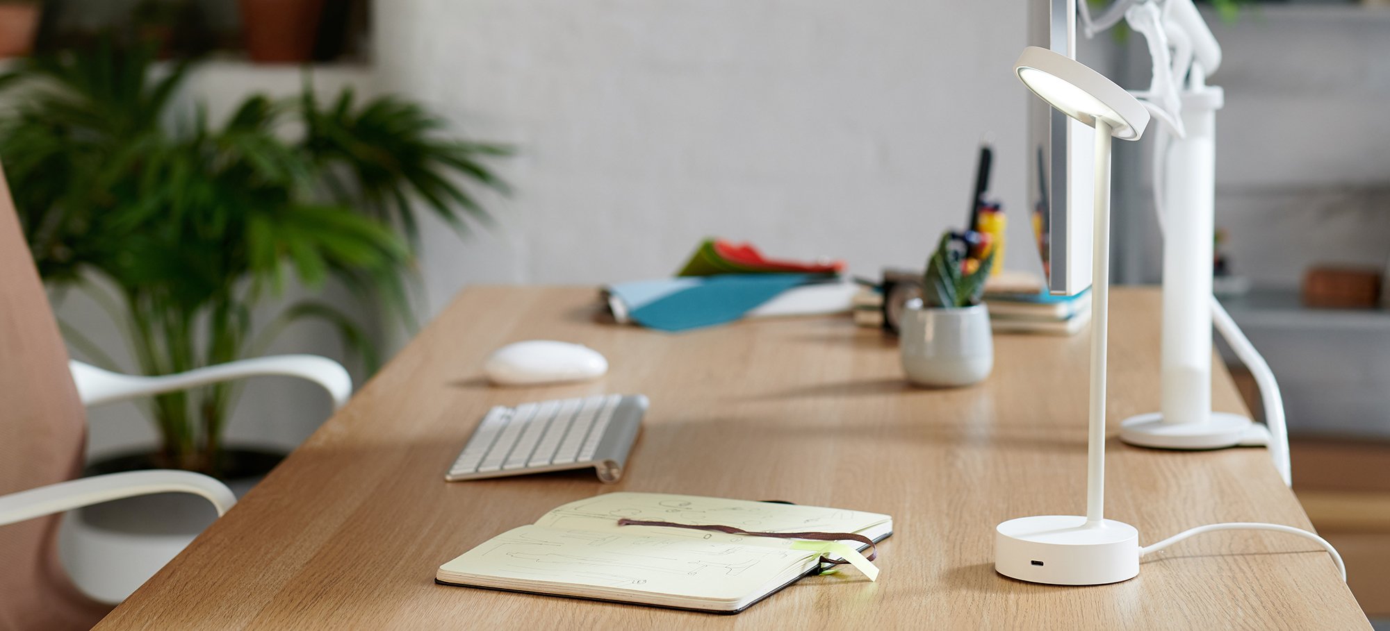 Lolly personal light on a home working desk